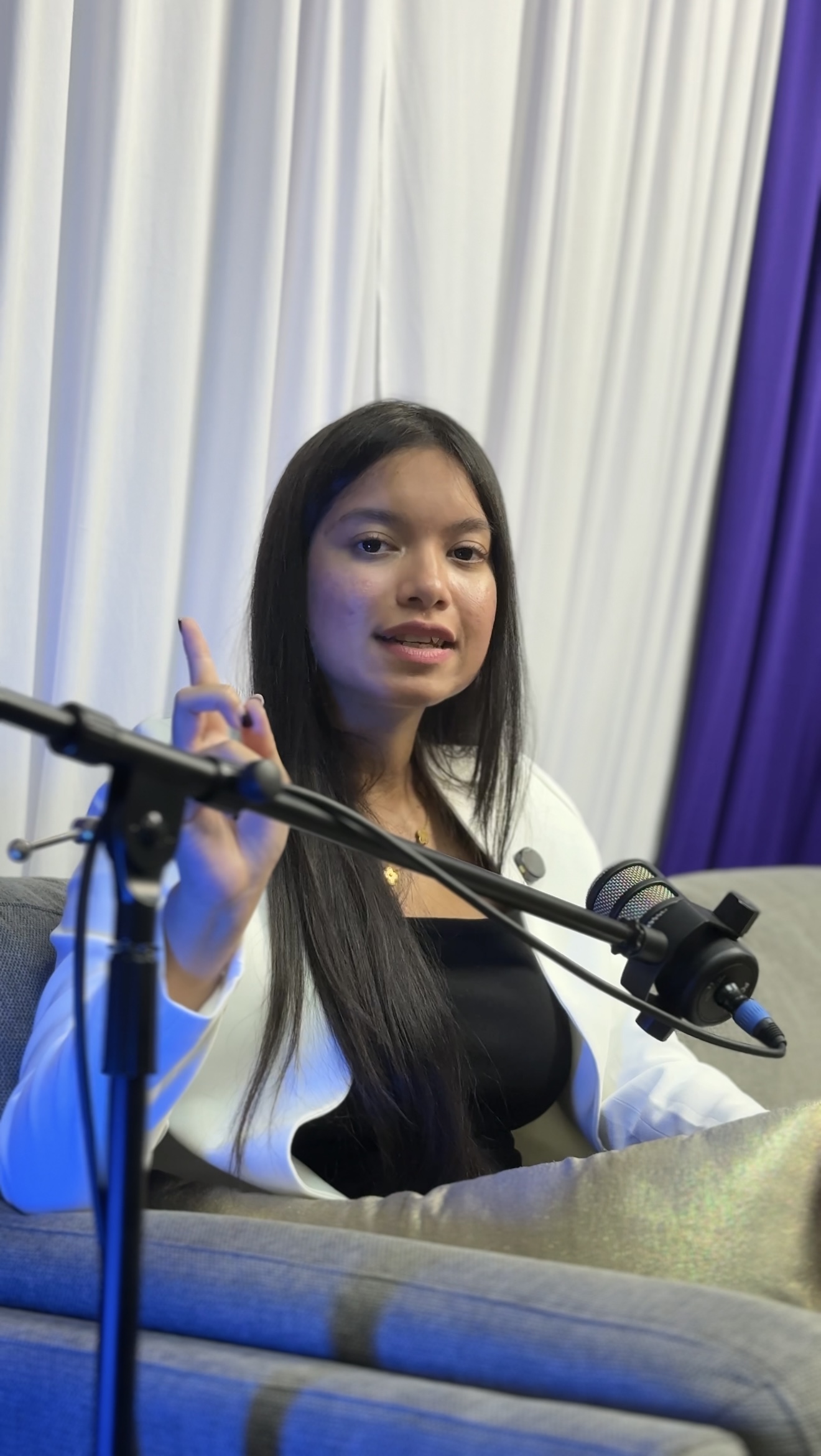 iViral creator speaking into a microphone